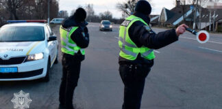 Police officers record violations