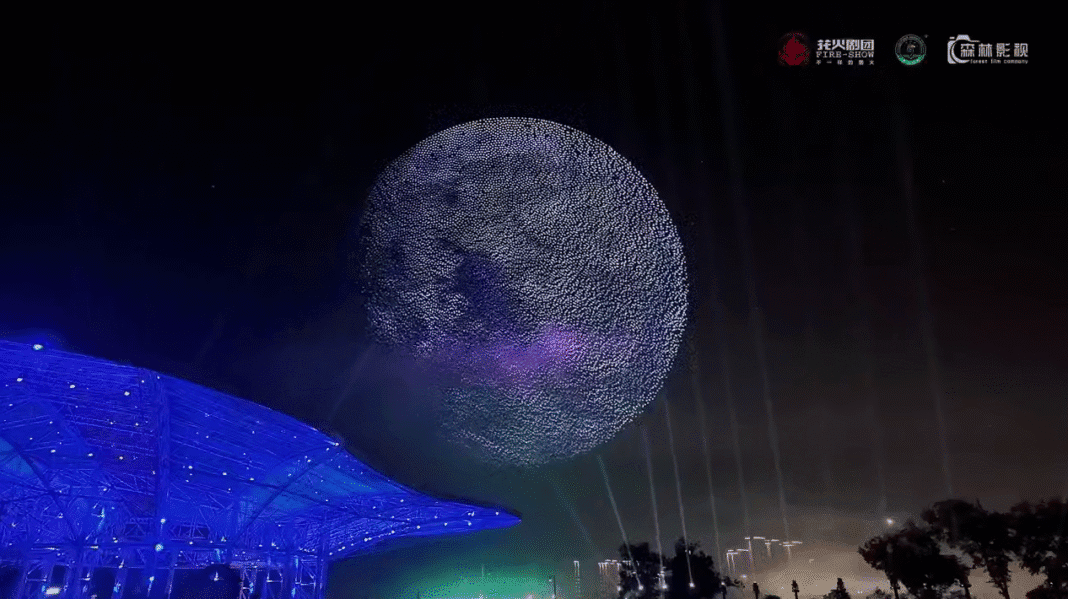 A light show in China with 15,947 drones simultaneously creating shapes in the sky.