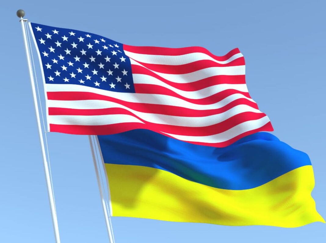 Flags of Ukraine and the United States during international negotiations