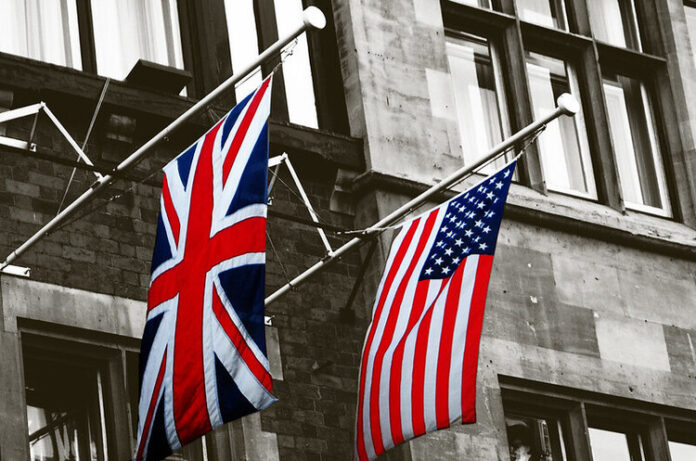 The flags of the United Kingdom and the United States against the background of the intelligence headquarters