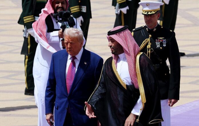 President Donald Trump greets Saudi Arabia's Crown Prince Mohammed bin Salman