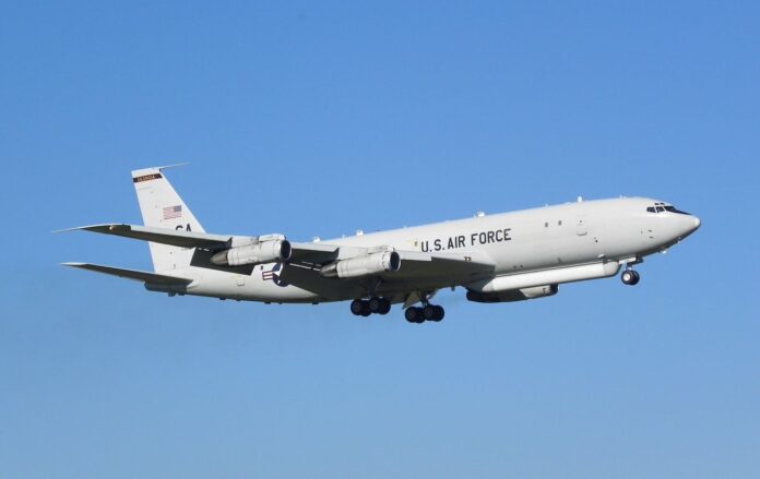 An aircraft in the sky over the Caribbean