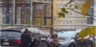 TCC workers at a school during the detention of a physical education teacher