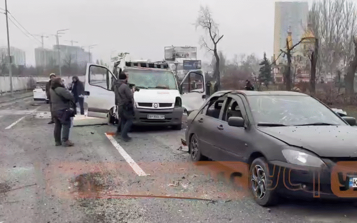 Damaged cars on the streets of Kyiv after rocket fragments fell