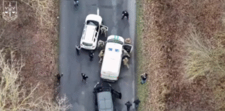 An armoured collection vehicle used to transport fugitives.