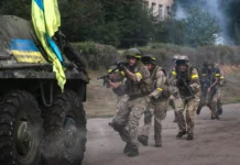 Сцена зйомки документального фільму про військову операцію ЗСУ на кордоні з РФ.