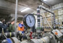 Heat supply partially restricted in Kyiv after night shelling Kyiv utility workers check heating networks after night attack