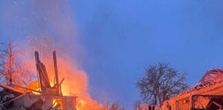 Consequences of an air strike on the village of Shestakove in Kharkiv region, destruction and fire