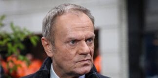 Polish Prime Minister Donald Tusk speaking at a press conference