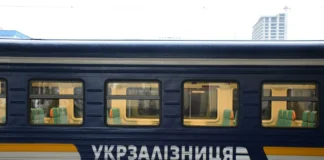 A Ukrzaliznytsia train in front of the station