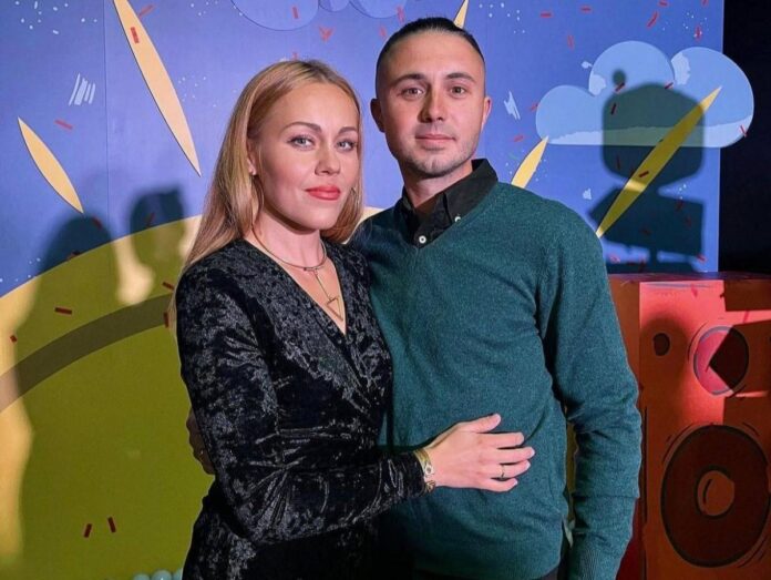 Taras and Olena Topoli in a family photo