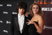 Miley Cyrus on the red carpet with a diamond engagement ring