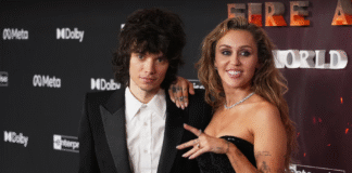 Miley Cyrus on the red carpet with a diamond engagement ring