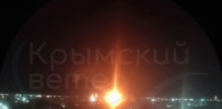Вибух у нічному небі над окупованим Кримом