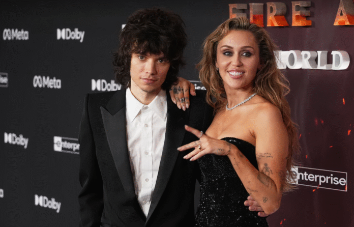 Miley Cyrus on the red carpet with a diamond engagement ring