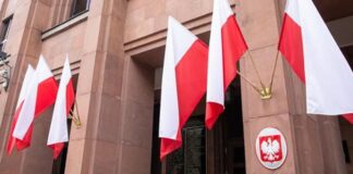 Polish flags outside a building of state institutions in Warsaw
