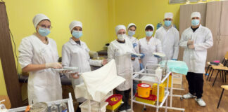 Medical students during a practical lesson