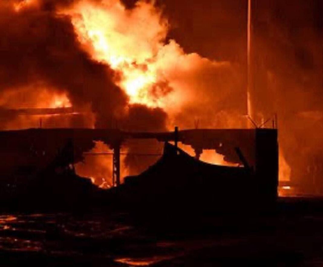 A burning energy facility after Russian shelling in Poltava region