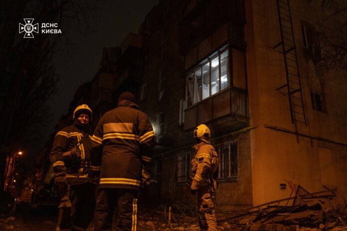 SES rescuers work near damaged house in Odesa after drone attack