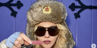 Мадонна у хутряній шапці з радянською символікою