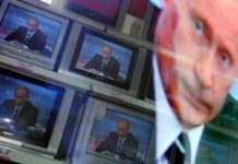 Russian media intimidate the world if the US takes action against Putin A Russian TV story with propaganda statements about the threat to the United States.