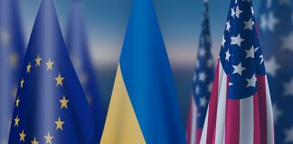 Прапори України та Євросоюзу на тлі повідомлень про переговори