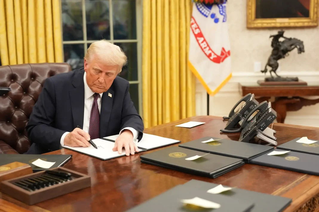 Donald Trump signs an executive order on a new global duty