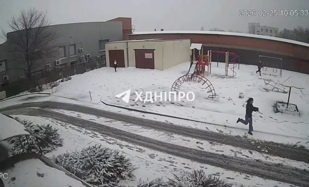 People leave the area during the inspection in Dnipro