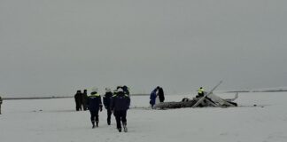 The crash site of a training aircraft in a snowy field
