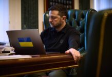 Volodymyr Zelenskyy working at his laptop