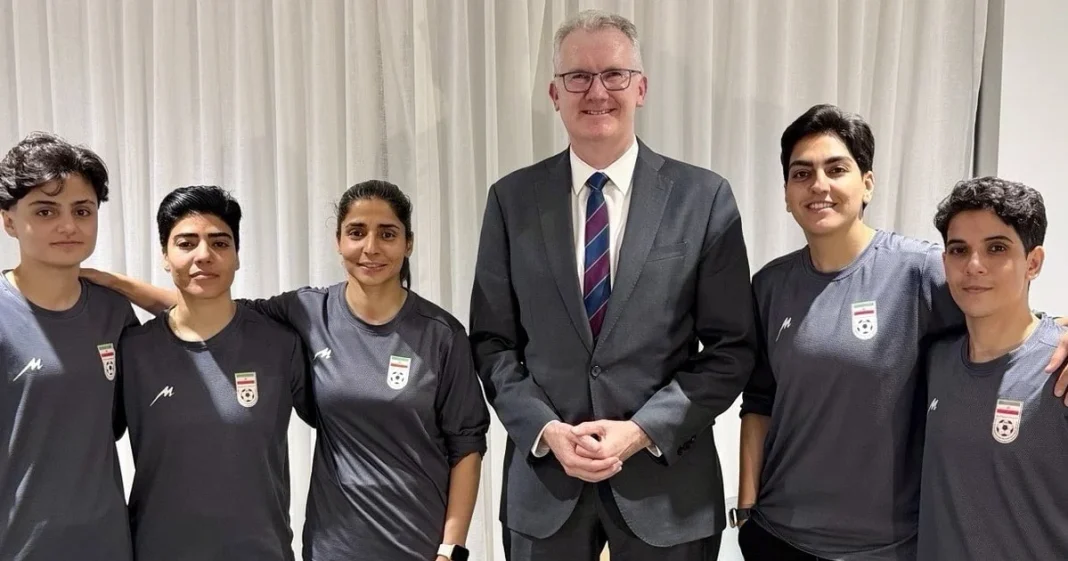 Five Iranian football players during a press event in Australia