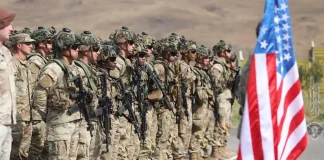 US troops leave a base in the Middle East.