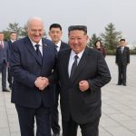 Lukashenko presents Kim Jong-un with an assault rifle
