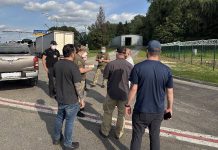 Ukrainian men after deportation from the US