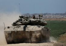Israeli armoured vehicles near the border with Lebanon