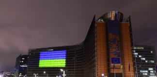 flags of the European Union outside the buildings of the institutions in Brussels