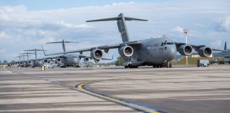 US plans new troop deployment in Romania military airbase with aircraft on the runway