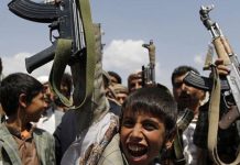 Іран залучає дітей до служби у КВІР Озброєні діти у КВІР на іранському блокпосту