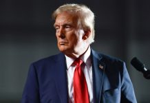 Trump considers new funding model for NATO Donald Trump speaks at a political event