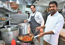 cook in the kitchen of a restaurant in India