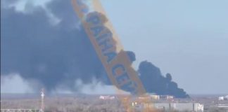 fire Troyeschyna Kyiv black smoke warehouse