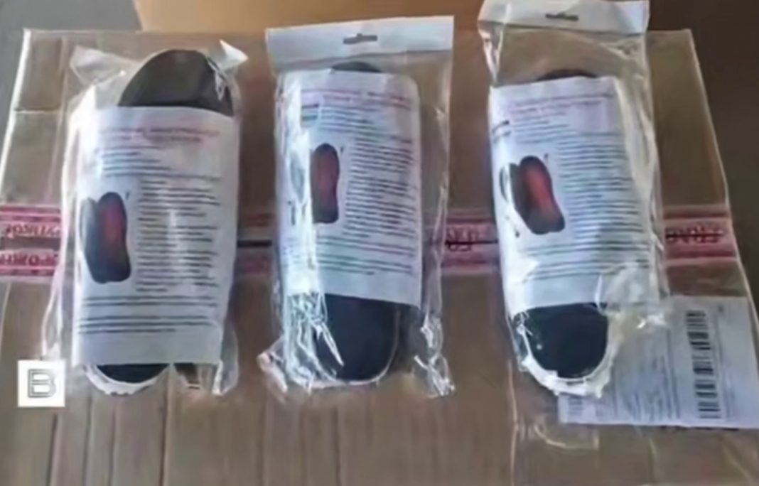 Photo of shoe insoles folded in a box