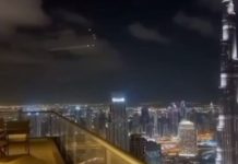 A view of the air defence system against the backdrop of the city of Dubai in the evening