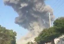 A thick column of smoke after an explosion in the Iranian city of Bushehr