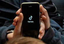 Trump administration to receive $10bn for TikTok deal Smartphone with open tiktok