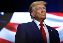 Trump loses interest in peace talks on Ukraine Trump on the background of the flag