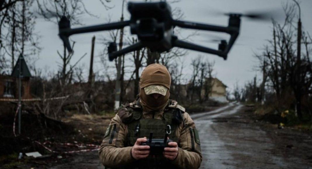 Ukrainian military personnel working with anti-drone systems