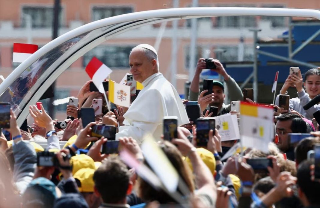The Pope speaking in Monaco against the backdrop of local architecture.
