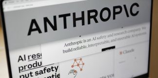 US could use Claude AI against Iran Anthropic logo on the laptop screen