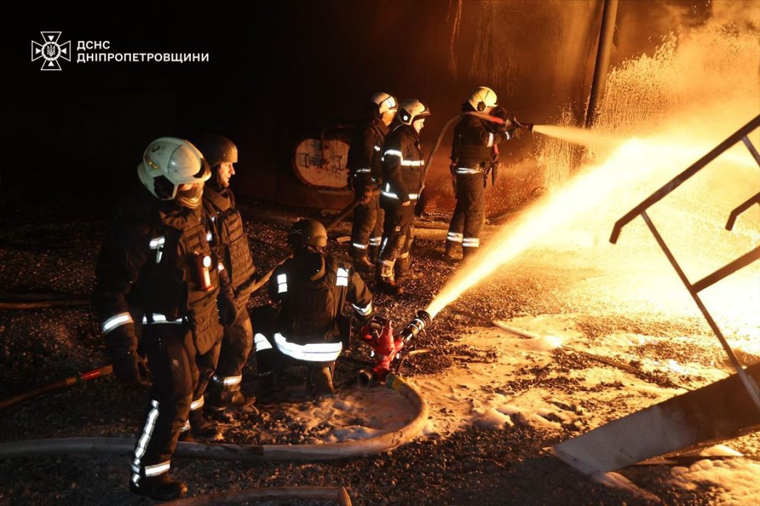 Rescuers extinguish massive fire after attack